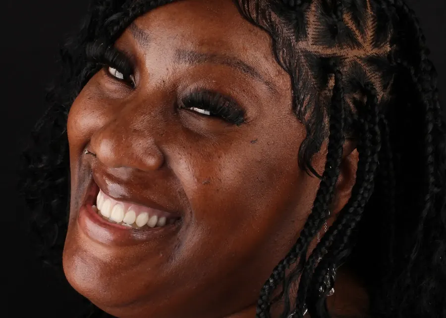 A patient laughing, photographed at Kerst & Caskey.